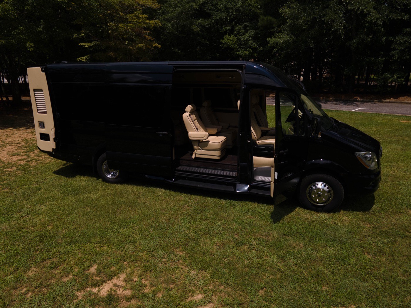 Black Van — exterior side view with door open